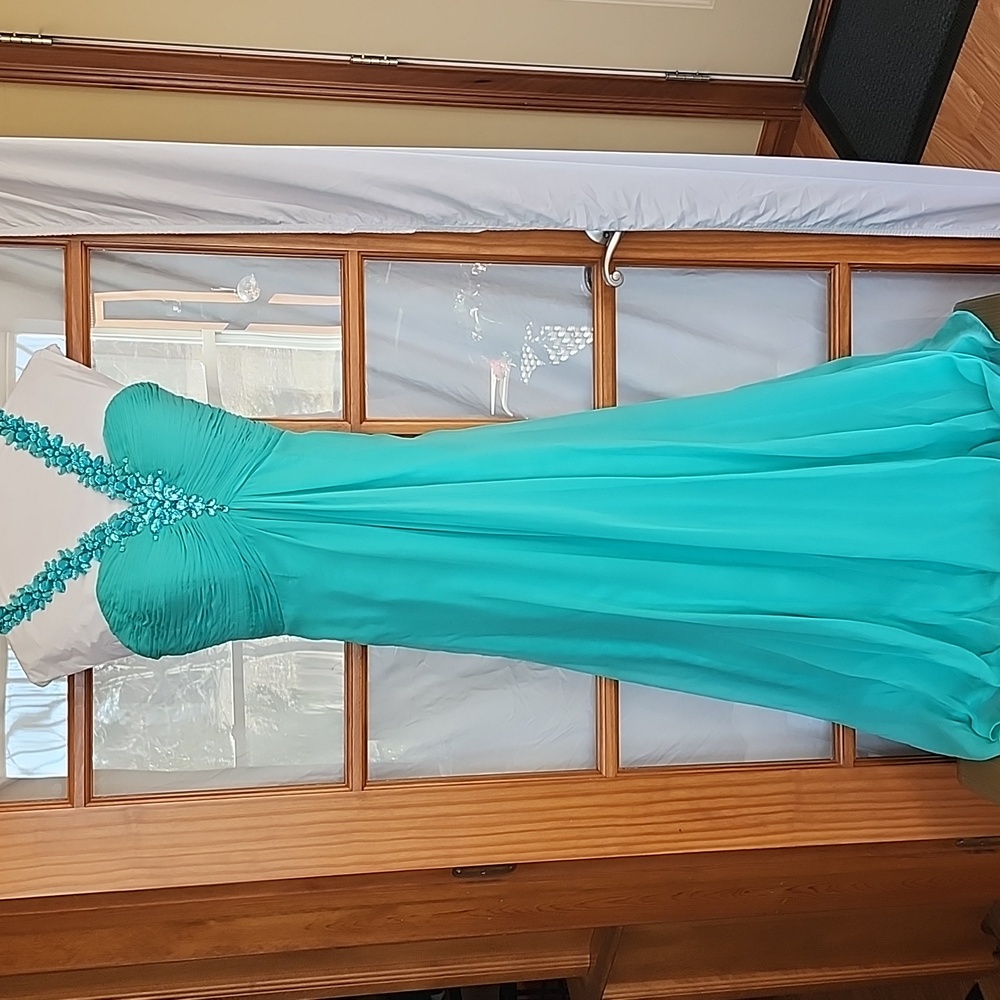Teal/mint green formal dress.  Preteen size 6.  Worn once in 2018.